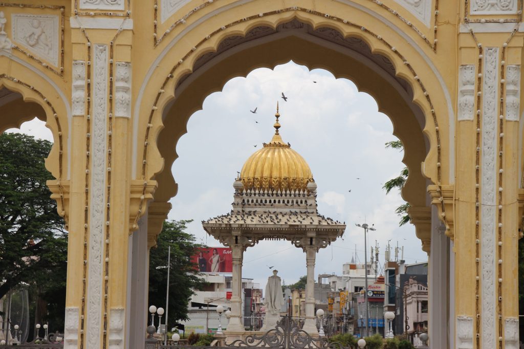 Photo taken from the Bengaluru Palace and showing the gate and the roundabout outside.