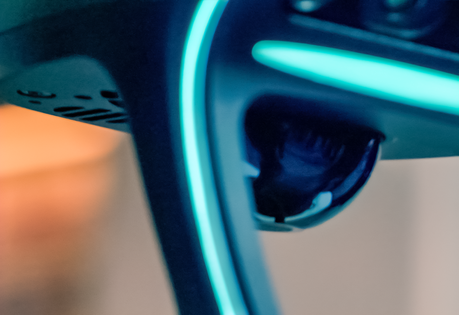 Close-up of a Unitree G1 head. The camera is visible inside a glowing frame.