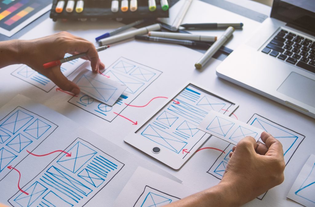 ux Graphic designer creative sketch planning application process development prototype wireframe for web mobile phone . User experience concept.
