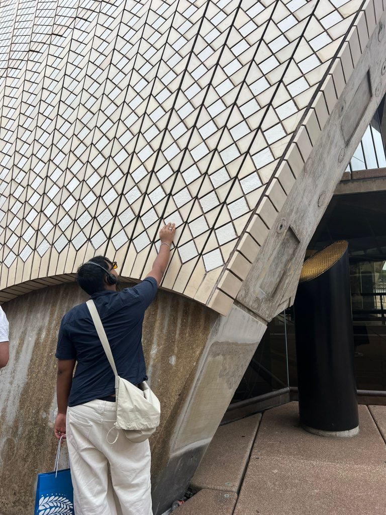 part 2 opera house (agash touching the specially made tiles, which only need rain to wash)